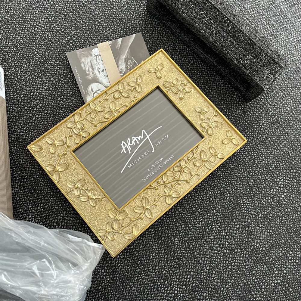 Michael Adam 4x6 gold picture frame with flower detail